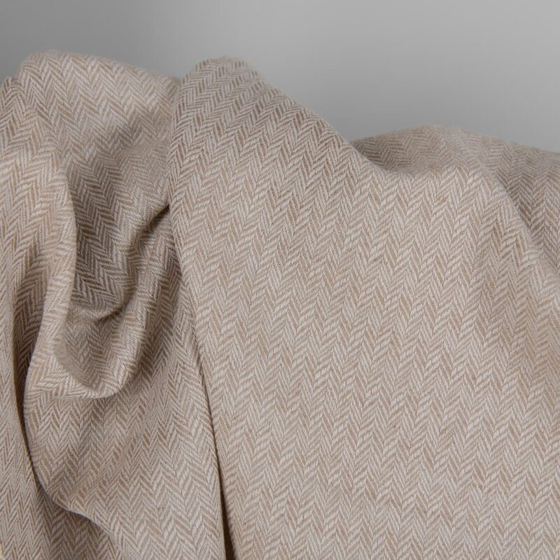 Brown and white linen cotton fabric in a herringbone pattern texture