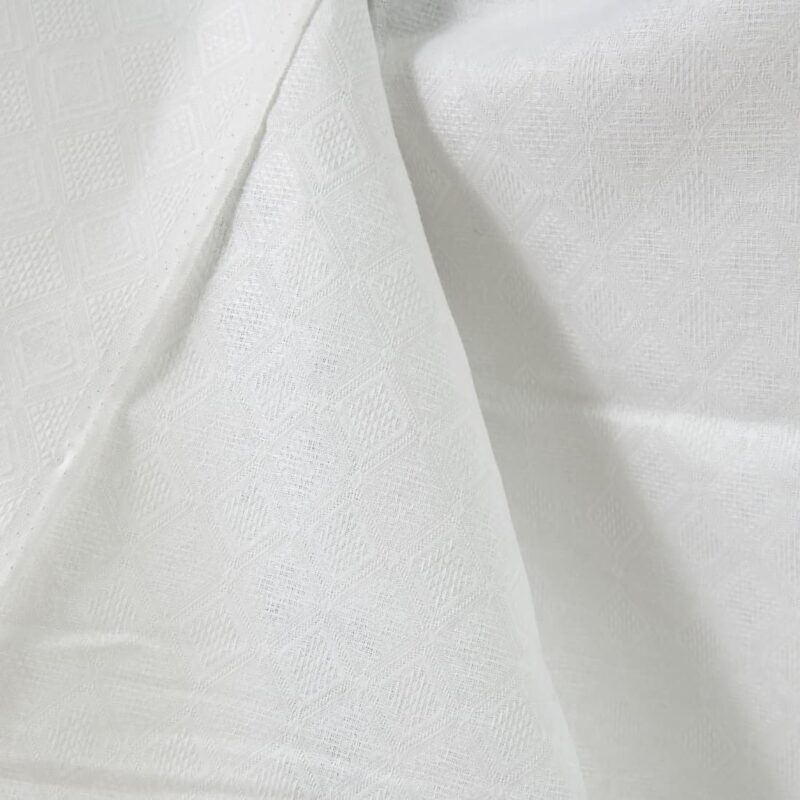 Linen cotton fabric optic white rhombus pattern close up detail