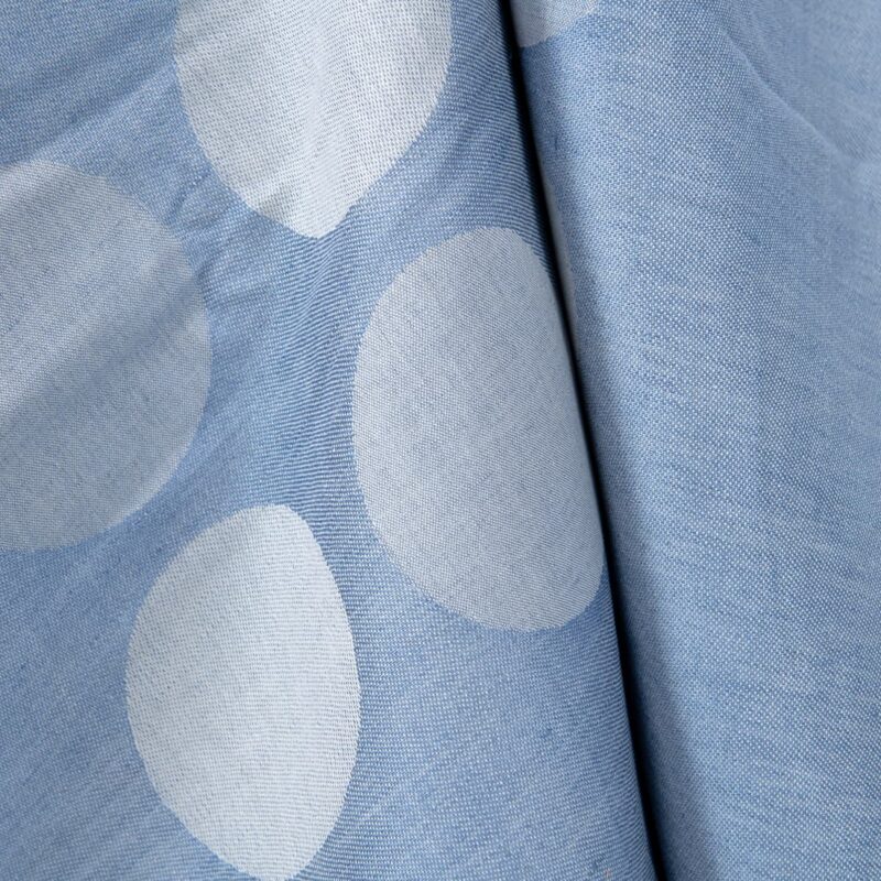 Linen cotton jacquard blue fabric contrasts circles.