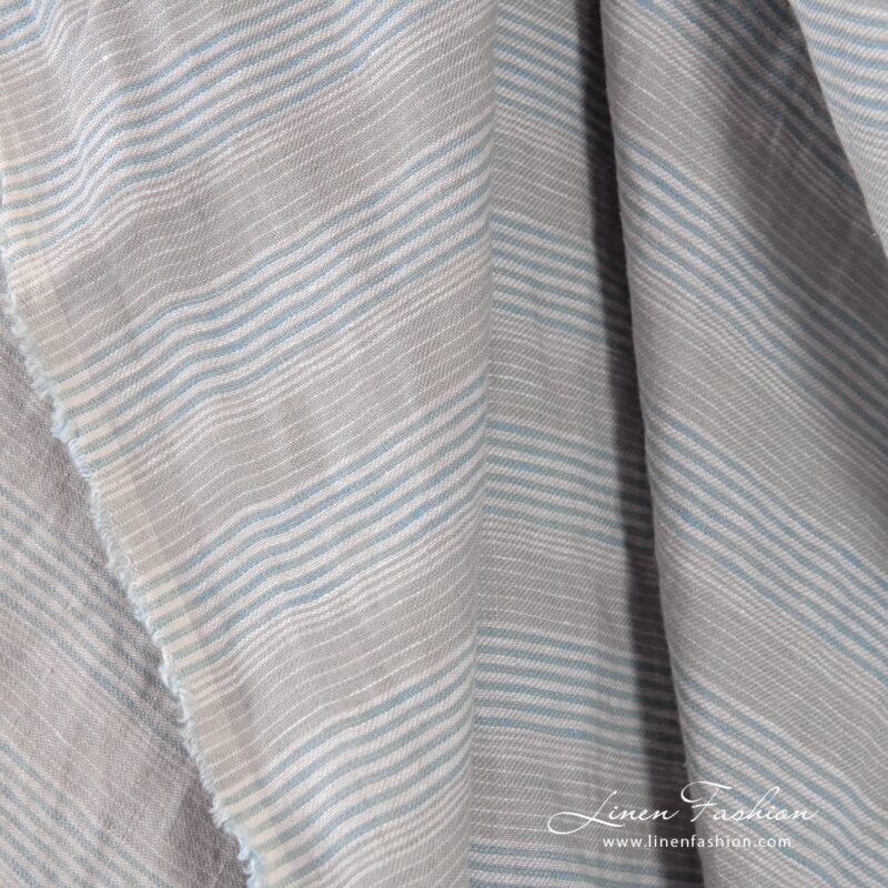 Grey blue linen fabric in stripes, specially washed to increase softness