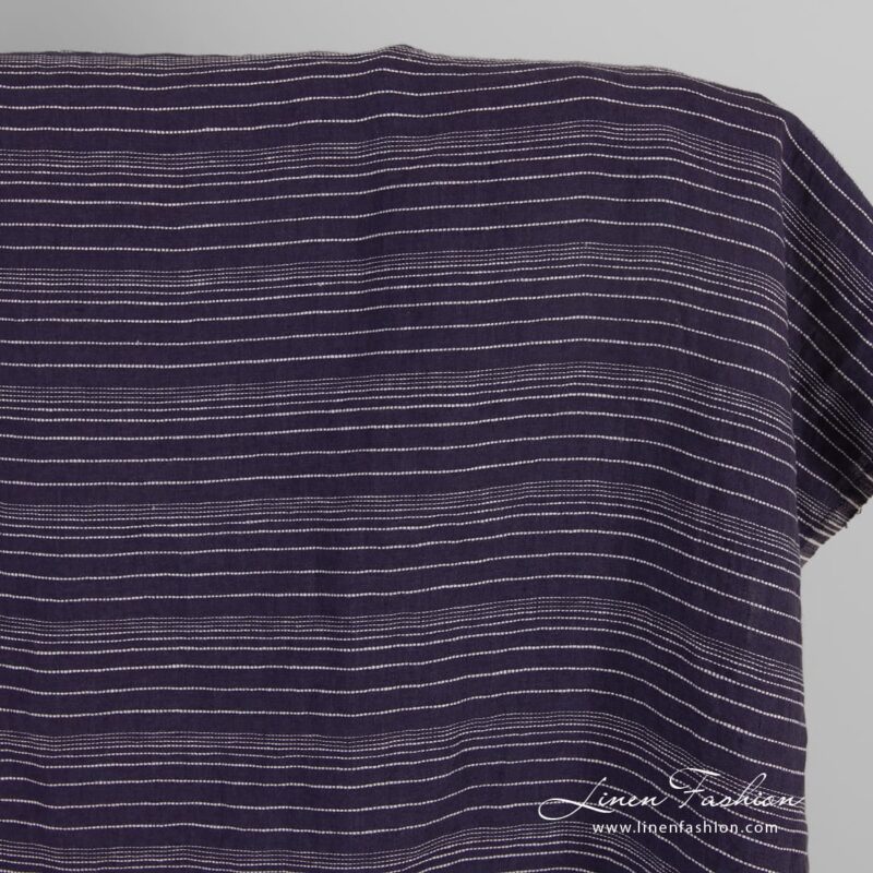 Dark blue linen fabric in stripes, washed