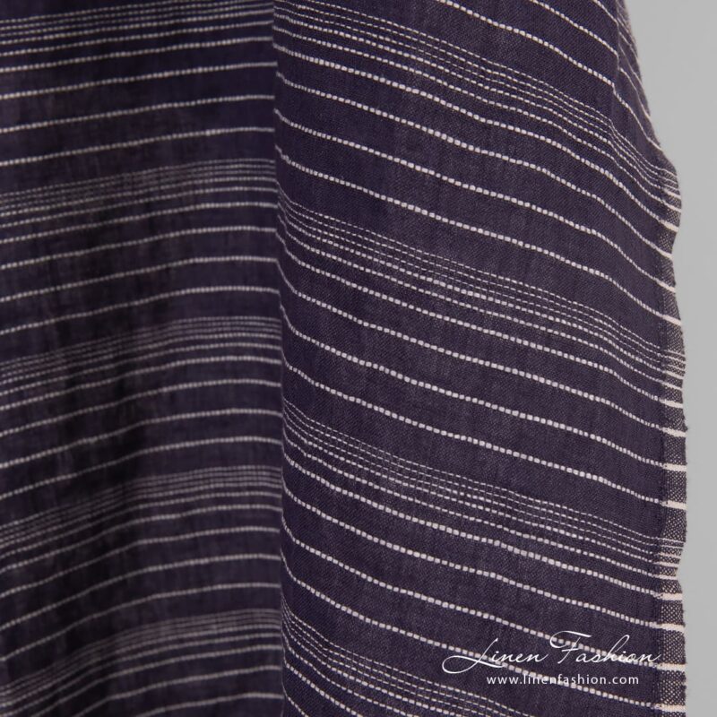Dark blue linen fabric in stripes, specially washed to increase softness