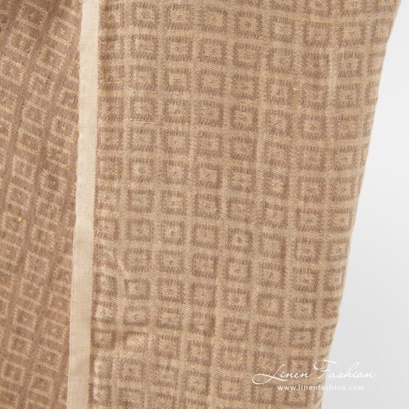 Jacquard linen fabric in light brown.