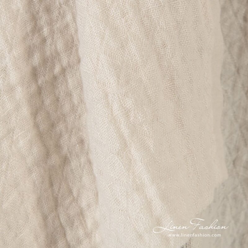 Light cream linen fabric in rhombus, specially washed to increase softness
