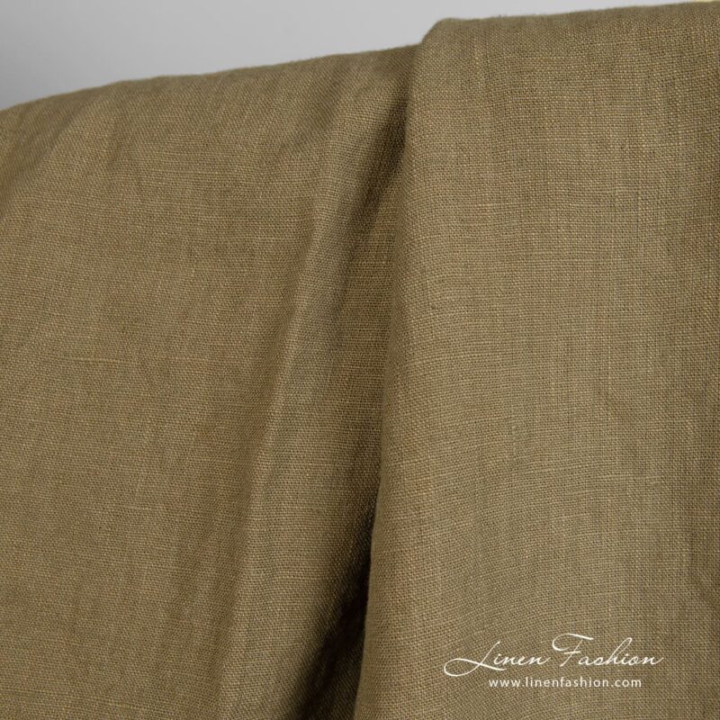Linen fabric in tobacco green, specially washed to increase softness