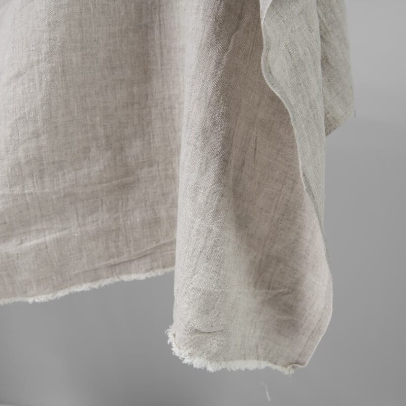 Washed heavy linen fabric beige colour edge view