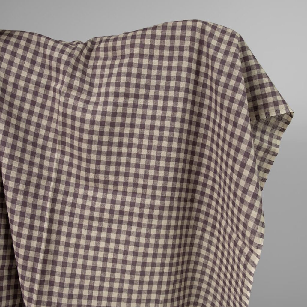 Linen fabric in natural and purple colour checks