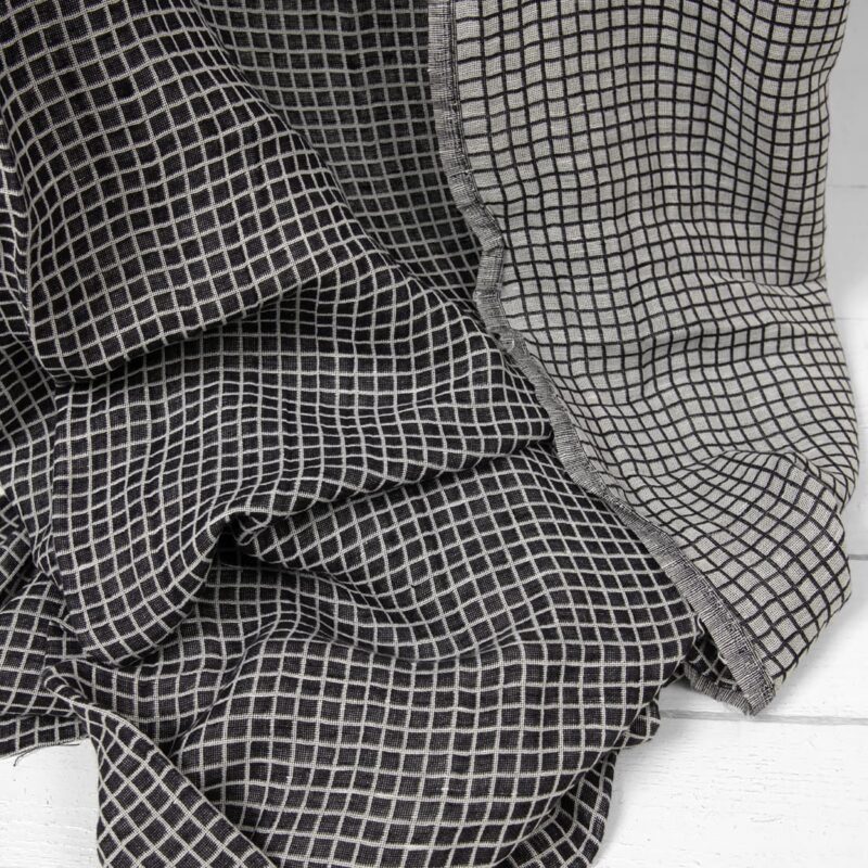 Half-linen fabric in black and white checks washed texture