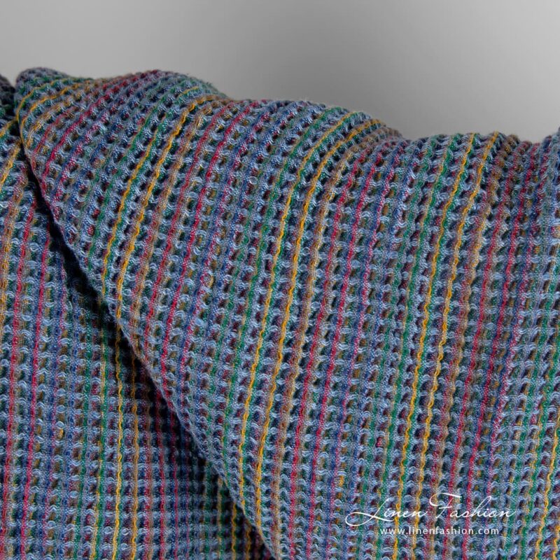 Blue linen cotton fabric in waffle pattern, specially washed to increase softness