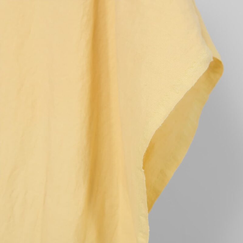 Washed linen cotton fabric light yellow, fabric edge
