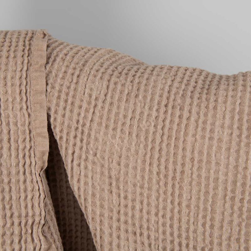 Washed linen cotton fabric light brown waffle close up detail