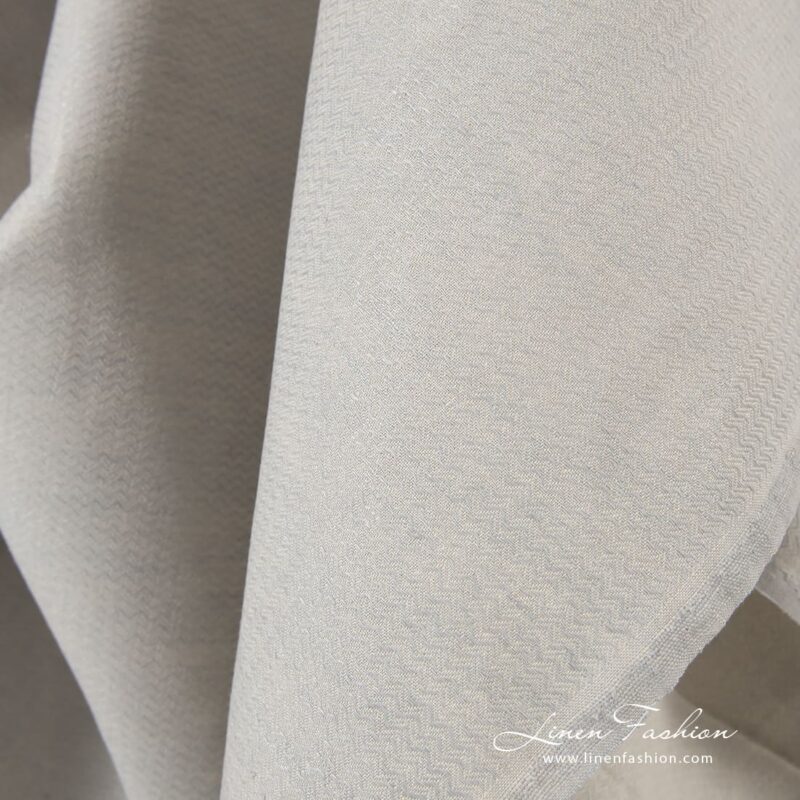 Bluish grey linen cotton fabric in zigzag pattern