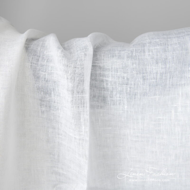 Lightweight linen fabric bright white colour close up detail