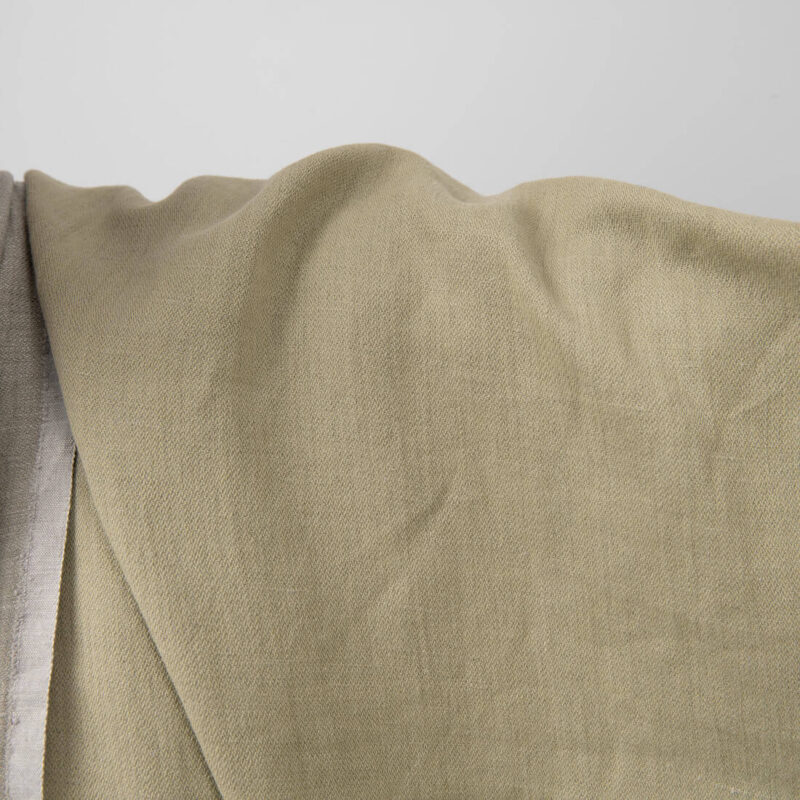 Olive green washed fabric double-sided close up detail