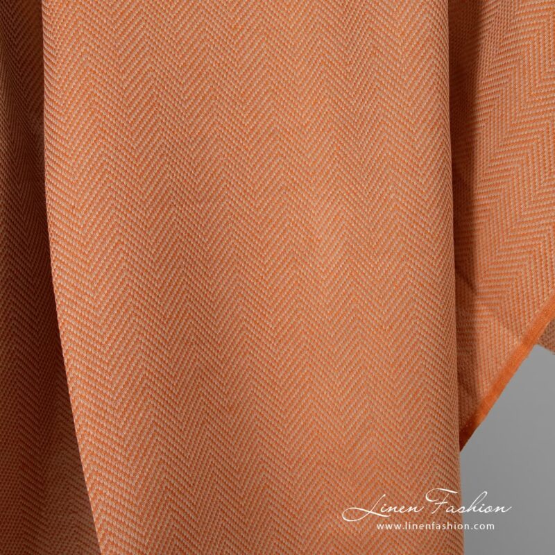 Herringbone linen cotton fabric in orange.