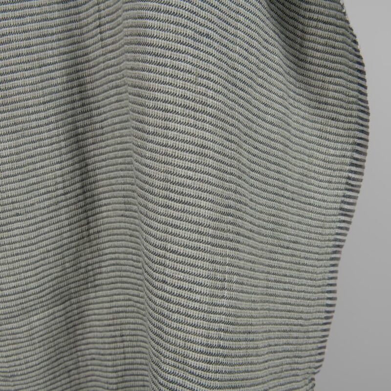 Washed linen fabric green-grey small pattern edge