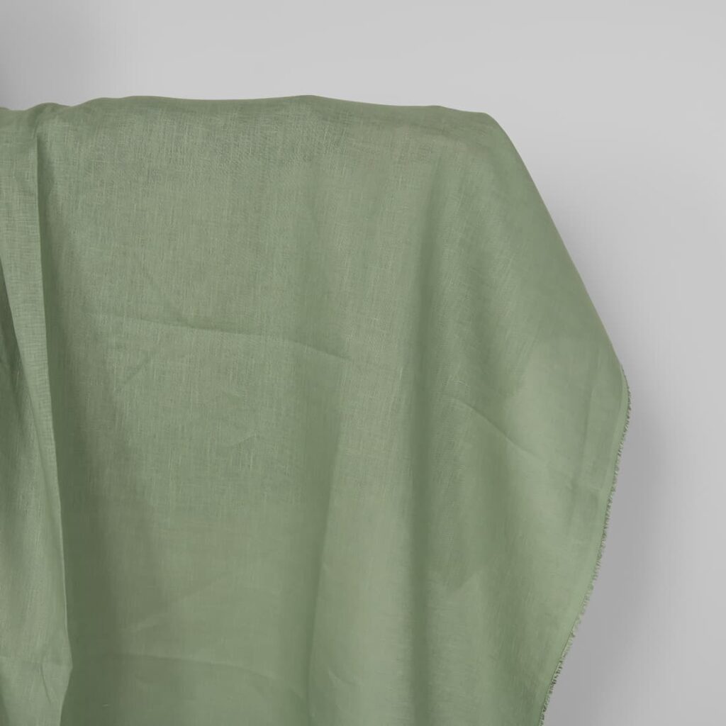Linen fabric in muted light green