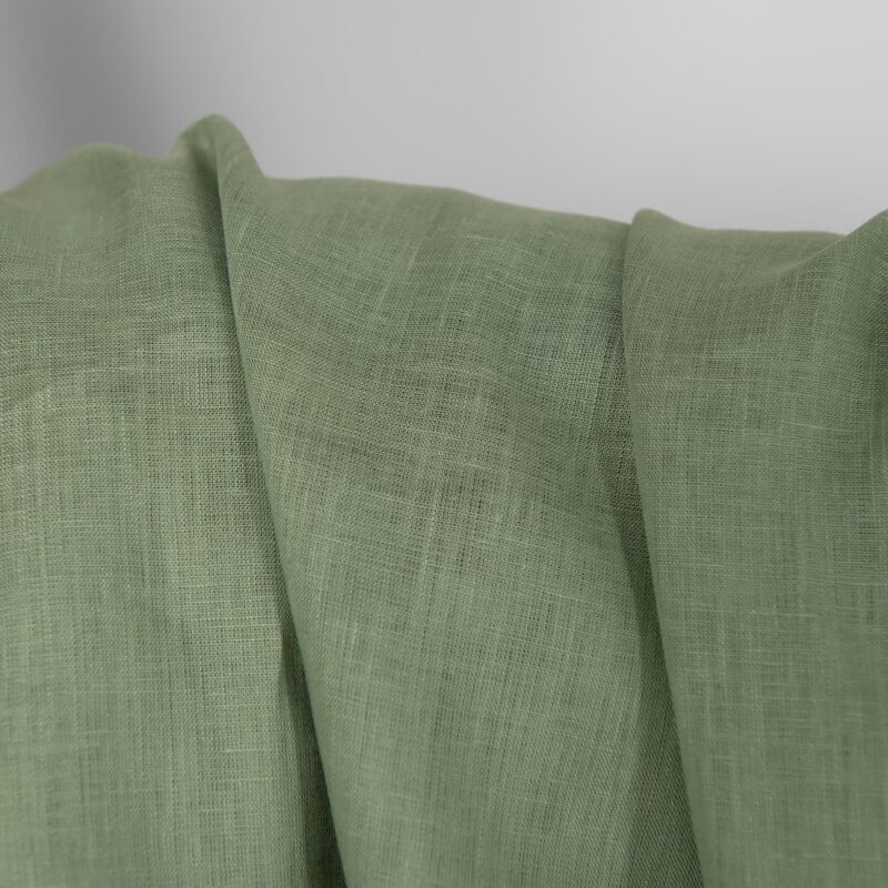 Linen fabric in muted light green, plain weave