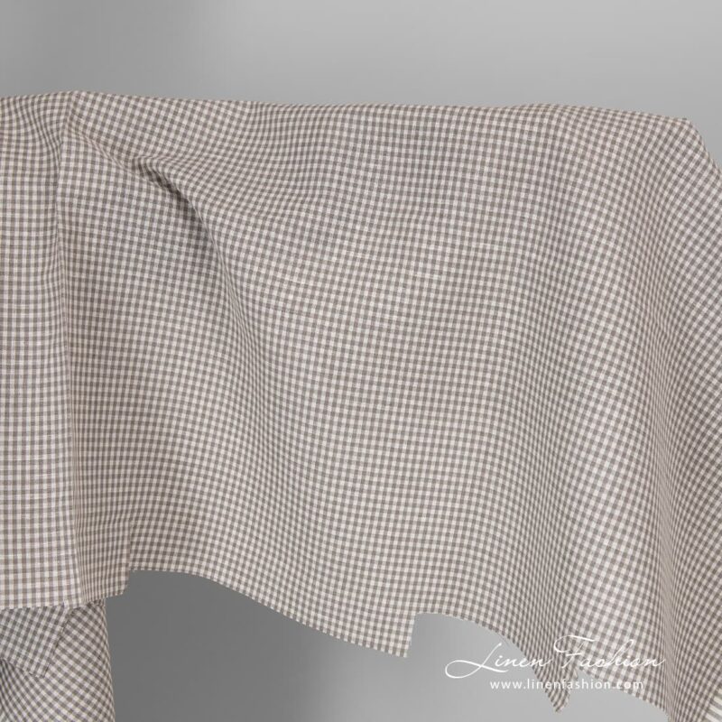 Linen cotton fabric in fine grey white checks.