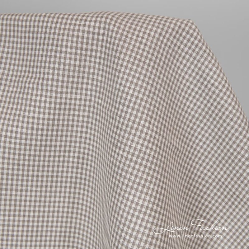 Linen cotton fabric in grey white checks.