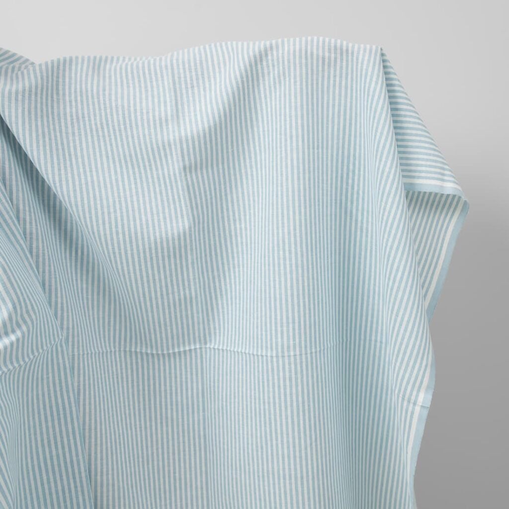 Wide linen cotton fabric in white and light turquoise stripes