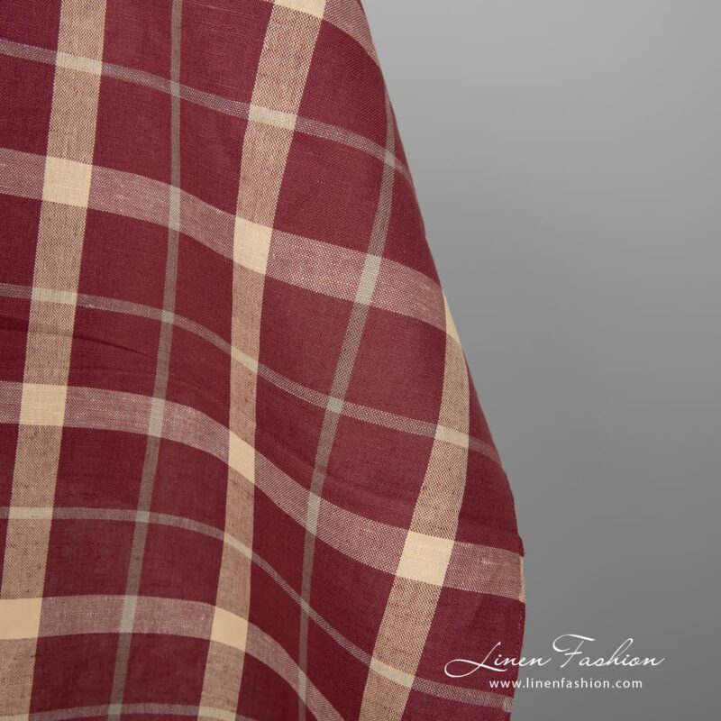 Cream checked linen cotton fabric in red.