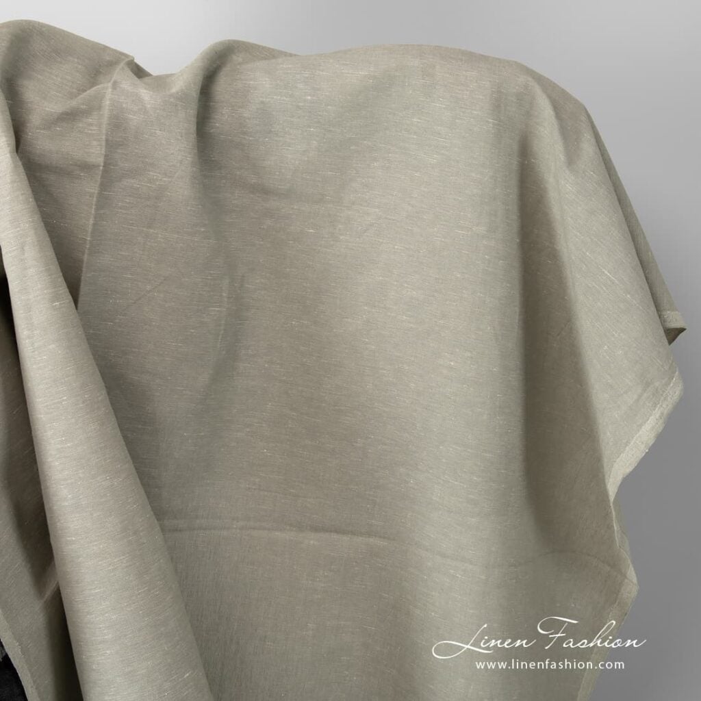 Melange greenish grey linen-cotton fabric.
