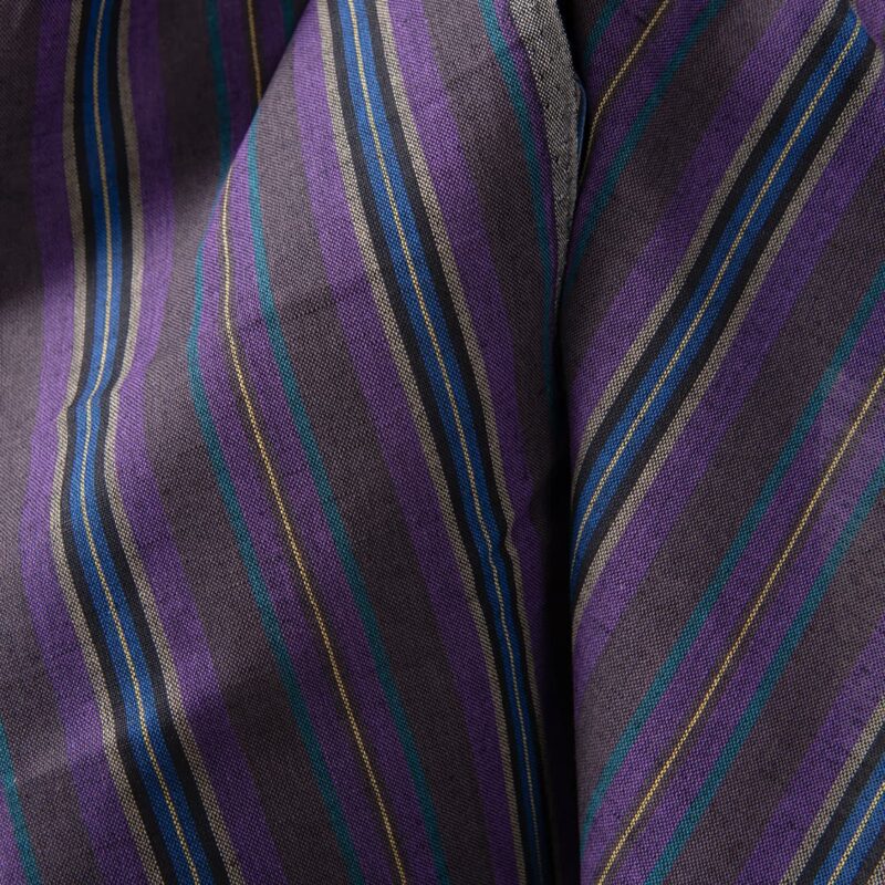 Linen cotton fabric in different shade violet stripes close up detail