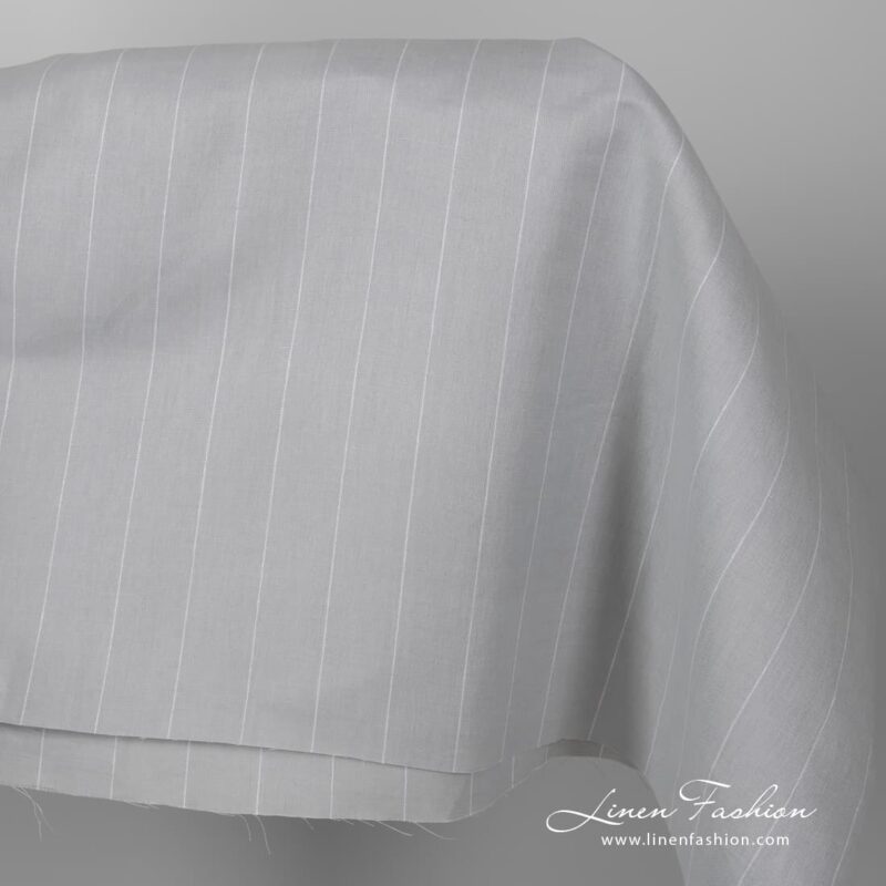 Wide light grey linen cotton fabric.