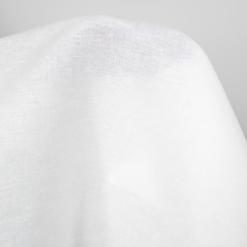 Wide linen cotton fabric in optical white close up detail