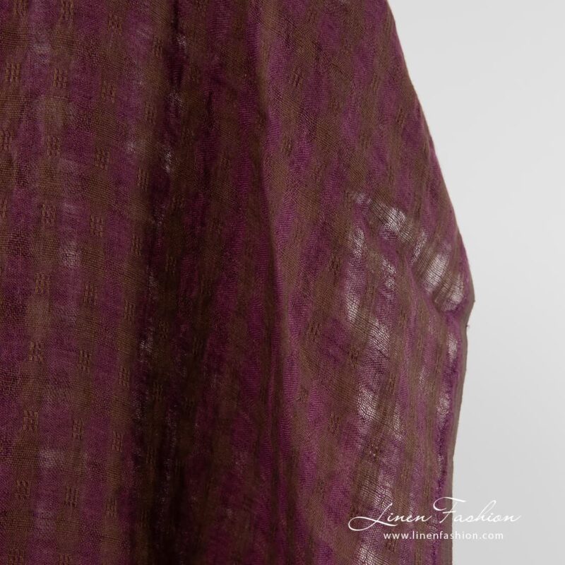 Washed 100% linen fabric in checks.