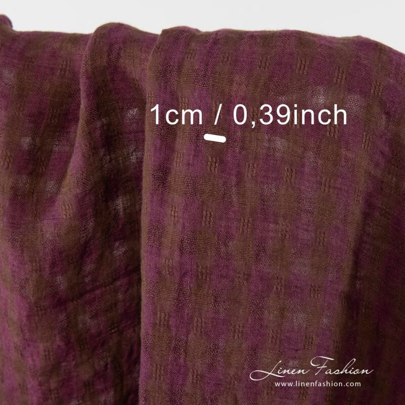 Checked 100% linen fabric in purple and purple checks,