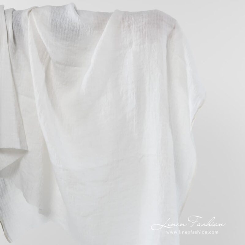 Off white linen fabric with checks.