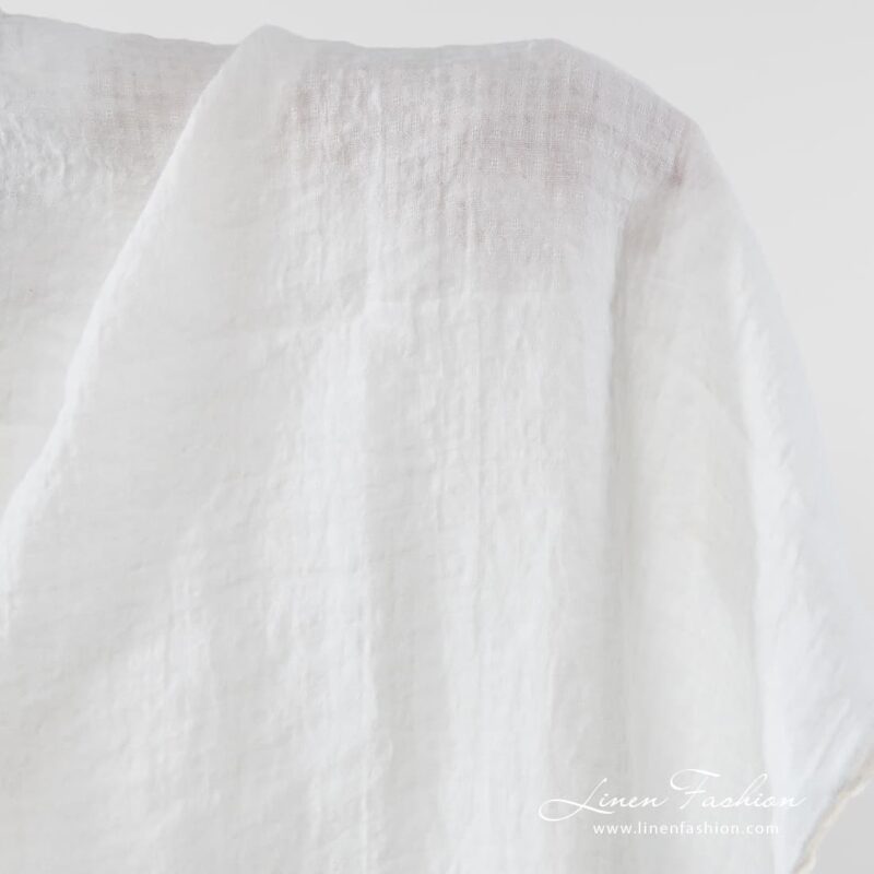 100% linen fabric in off white colour.