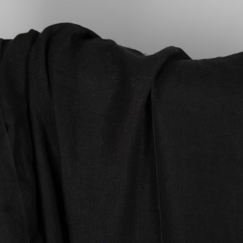 Black washed linen fabric in herringbone texture