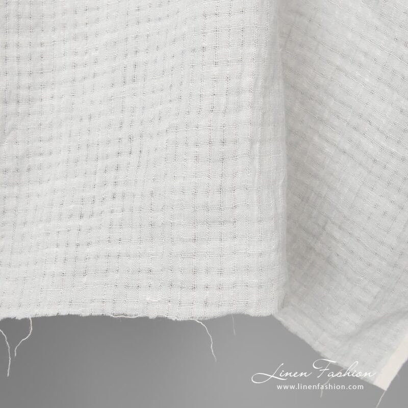 Light grey washed openwork linen fabric is perfect to sew the summer clothes and shawls