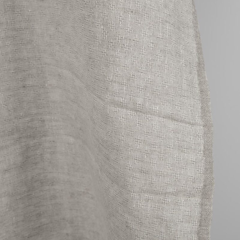 Openwork patterned linen fabric in beige edge