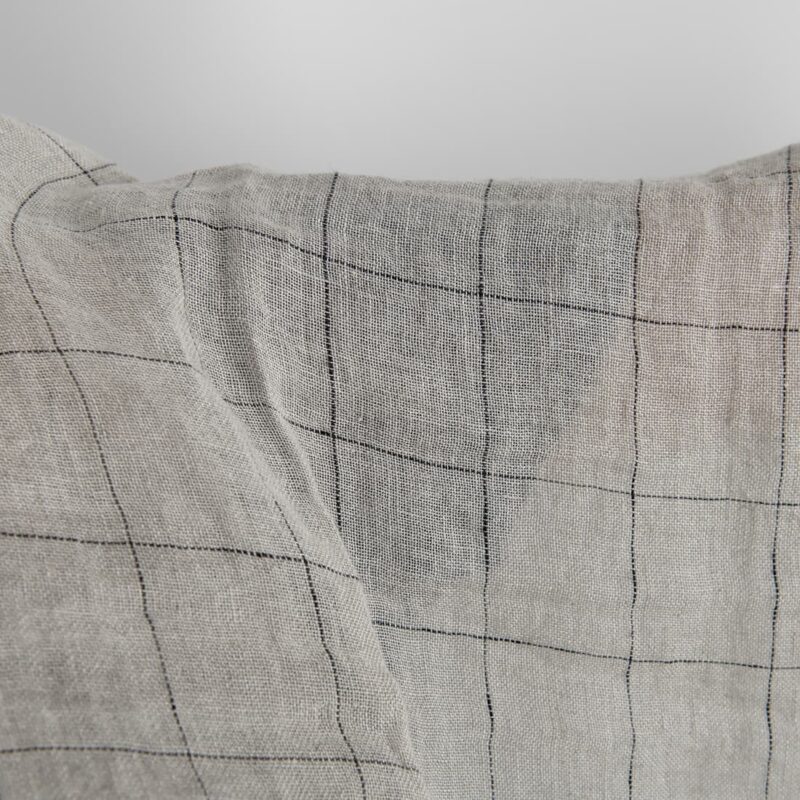Natural transparent checked linen fabric washed close up detail