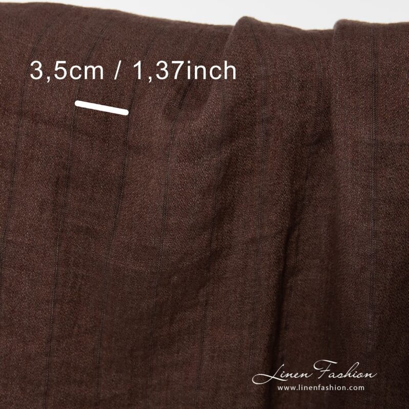 100% linen fabric in brown colour, washed.