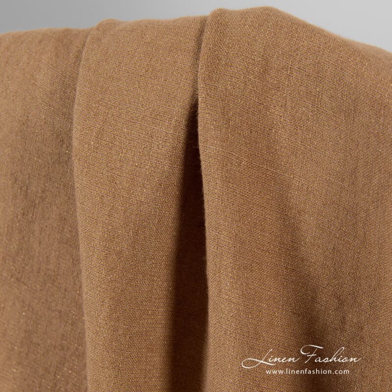 Light brown linen fabric with golden lurex, washed