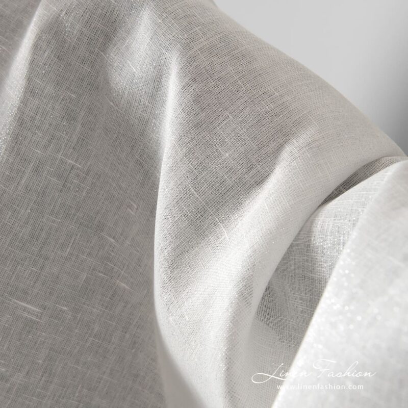 Off-white linen fabric with silver lurex, perfect for festive clothes and home textile