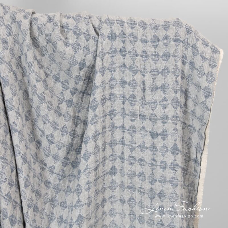 Linen cotton fabric in grey rhombus washed.