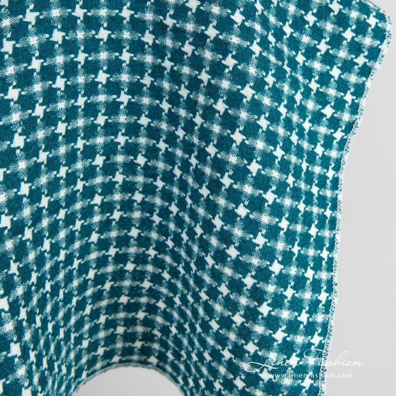Linen fabric in dark turquoise and off-white color