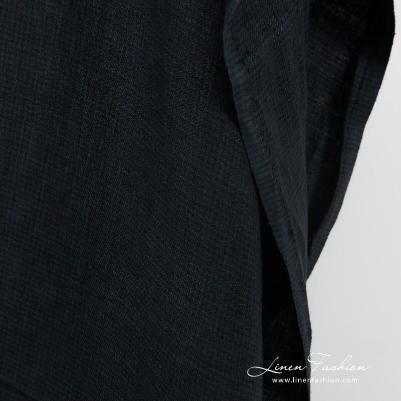 Dark blue linen fabric in twill weave and barely visible checks, specially washed