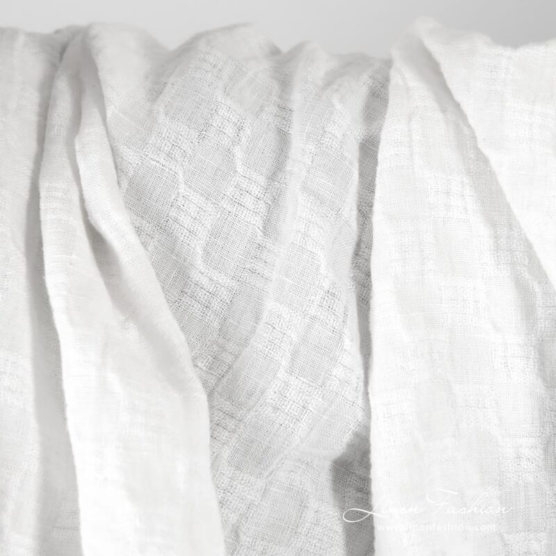Optical white linen fabric in checks, specially washed to increase softness