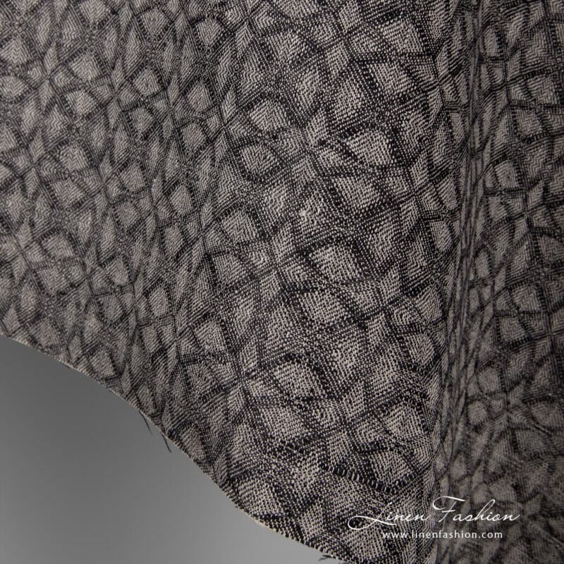 Geometrical black grey linen fabric.