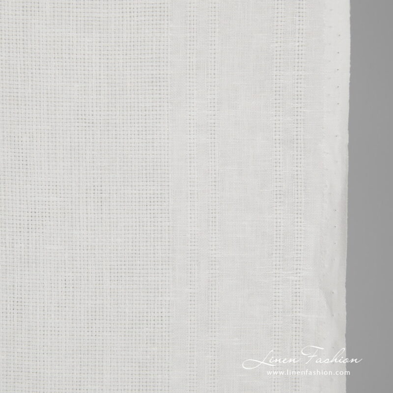 Narrow linen fabric white patterned close up detail
