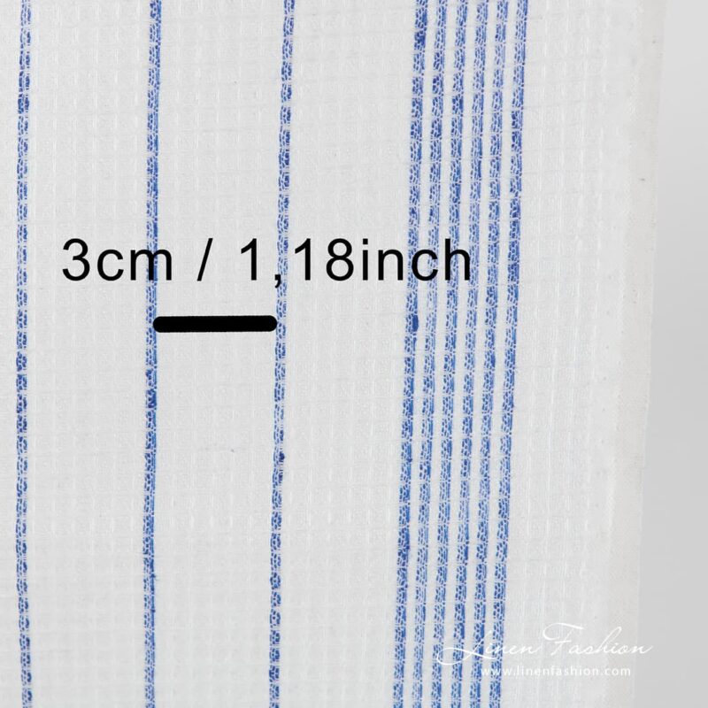 Off white linen fabric with blue stripes.