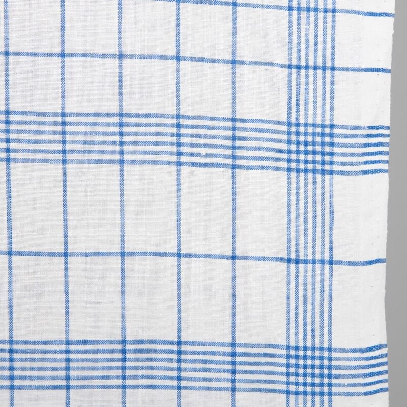 Narrow linen fabric bright white with blue checks close up detail