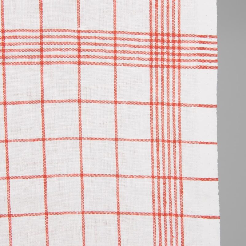 Narrow linen fabric bright white with red checks close up detail